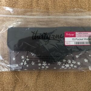 Thirty-one trifold wallet new in bag.